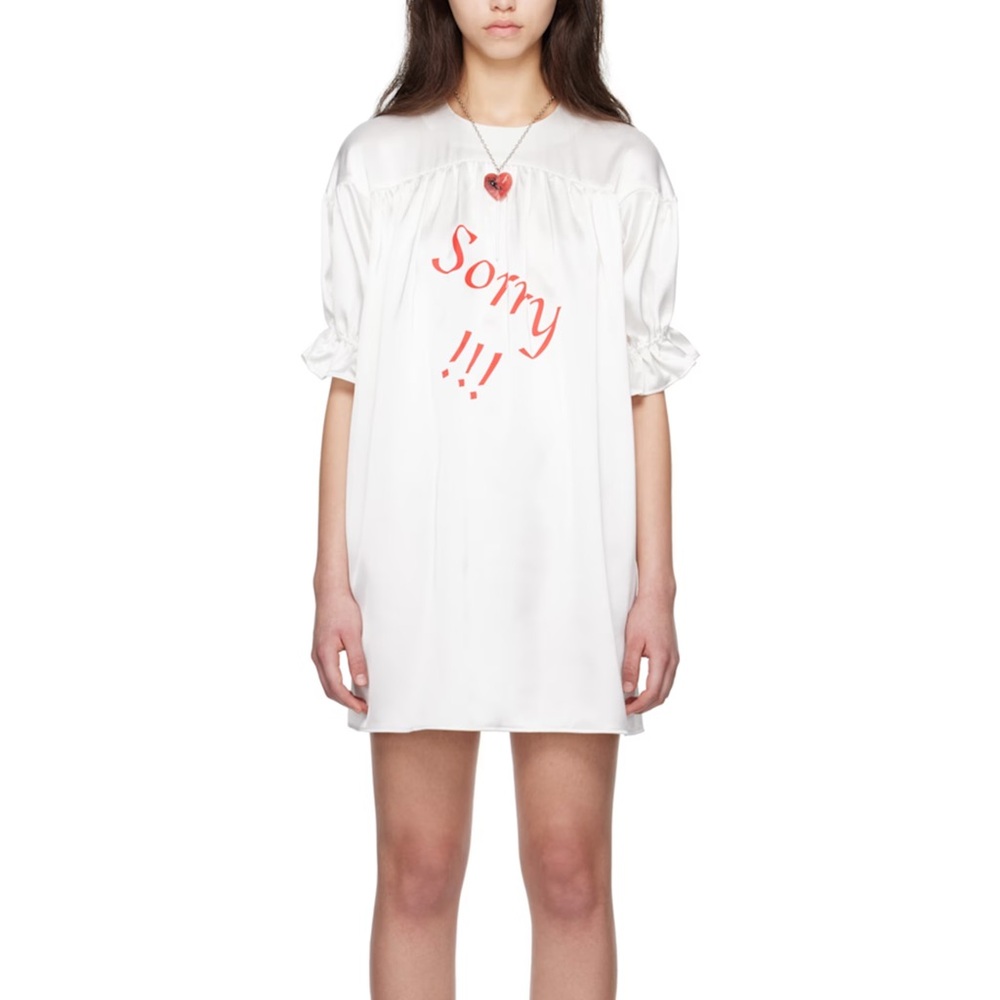Petra Collin’s Ssense White Long Sleeve Shift Dress with 'Sorry' Print